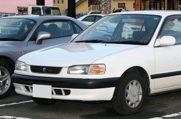 Generasi Kedelapan Toyota Corolla (E110; 1995): Mesin Aluminium 1ZZ-FE & Evolusi Global
